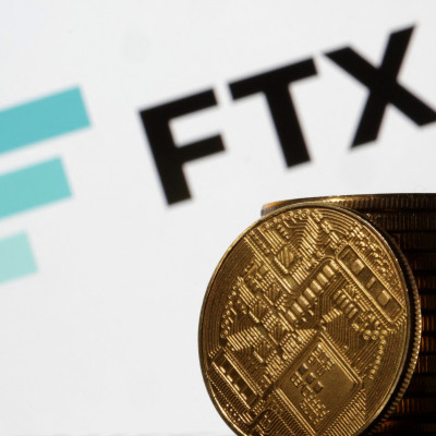 Ilustrasi menunjukkan logo FTX