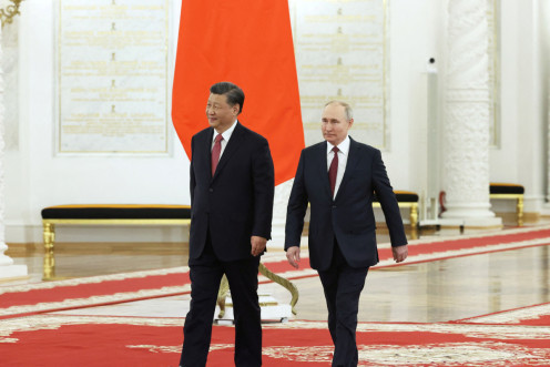 Putin Rusia mengadakan pembicaraan dengan Xi China di Moskow